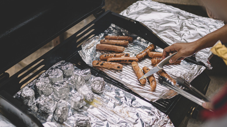 Grilling hot dogs on foil